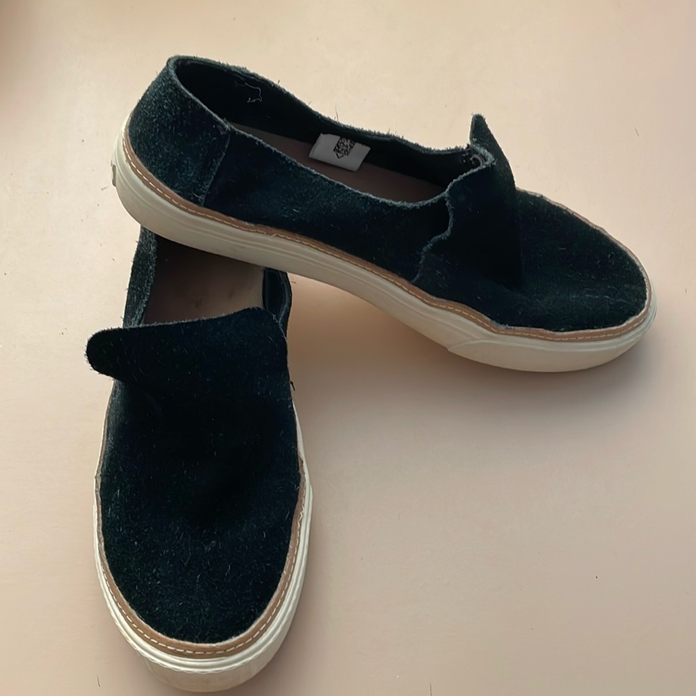 Toms black suede slip ons